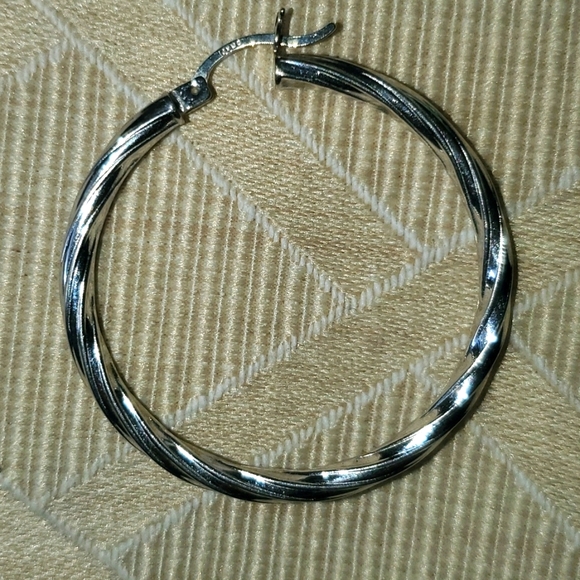 One Italian 14 karat gold white gold earrings from Costco . - Picture 6 of 6